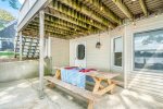 Step out the lower level onto the patio with picnic table and great views of Hutchins Lake